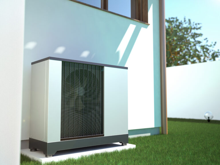 Air heat pump beside house