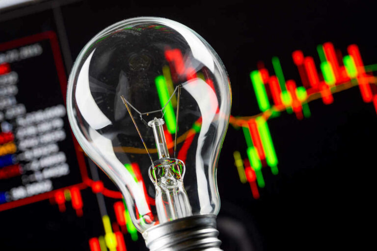 Business success with stock graph and light bulb