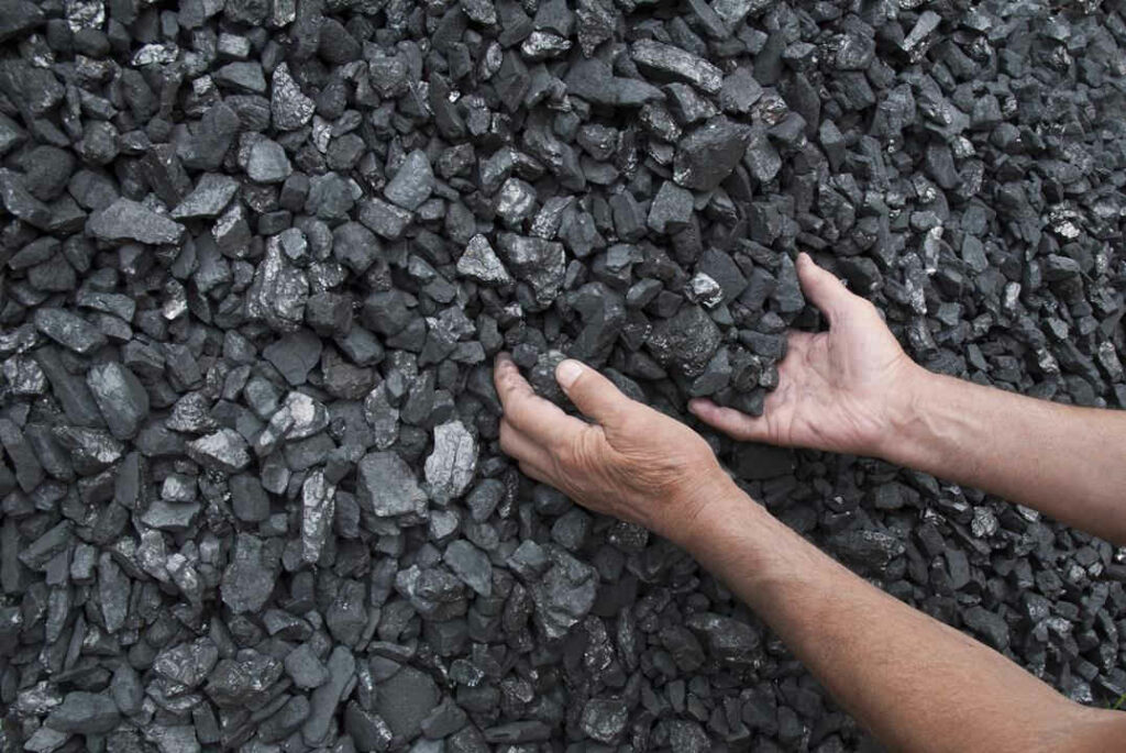 Hands of coal miner