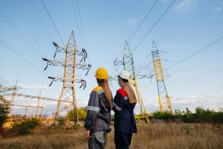 Women’s collective of energy workers conducts an inspection of equipment and power lines. Energy.