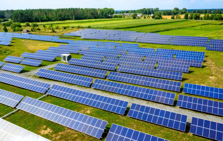 Aerial view top view on blue solar pannels