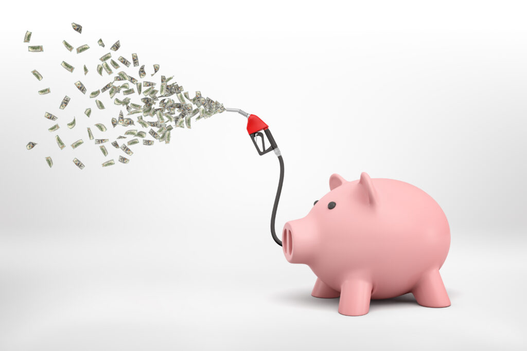 3d rendering of a piggy bank with a hose from a fuel filling column sprinkling cash out of it.