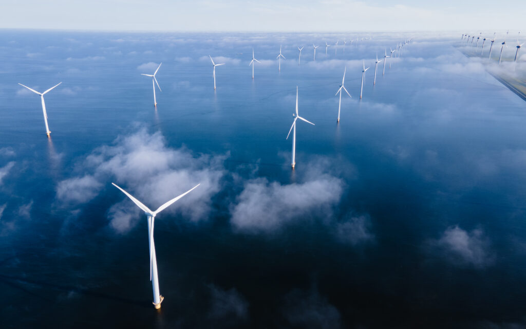 Windmill turbines at sea a huge winmill park in the Netherlands during winter