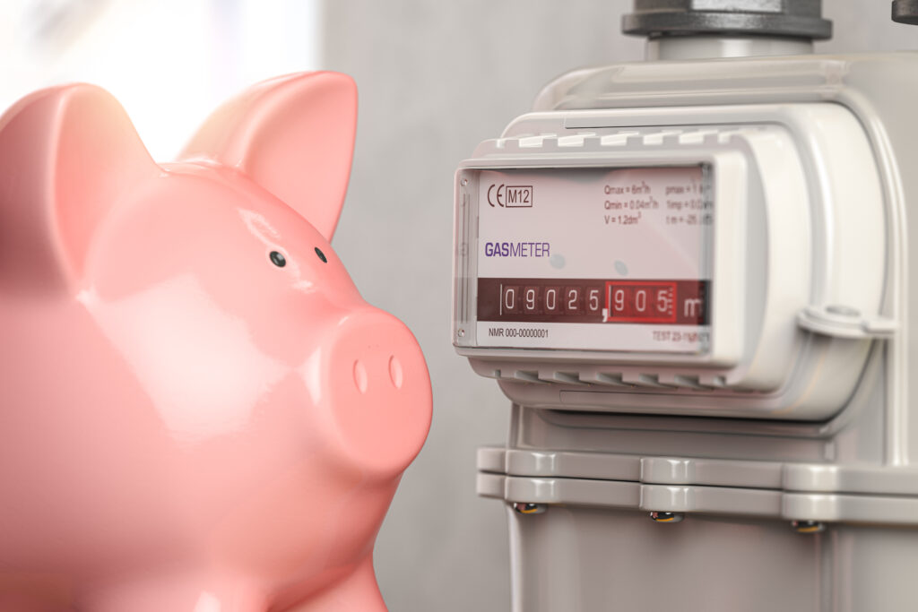 Piggybank and gas meter. Saving natural gas, energy costs and en