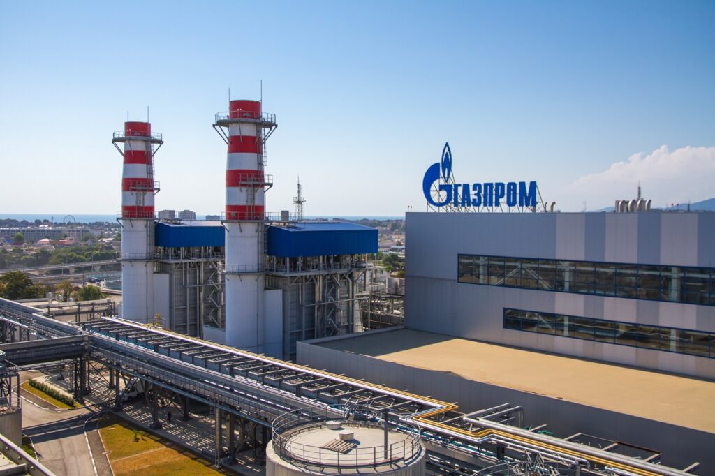 ADLER, RUSSIA – JUNE 26, 2013: Gazprom company logo on the roof of thermal power plant.