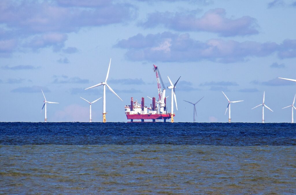 Seascape with a wind farm and gas platform in the Irish Se North Wales