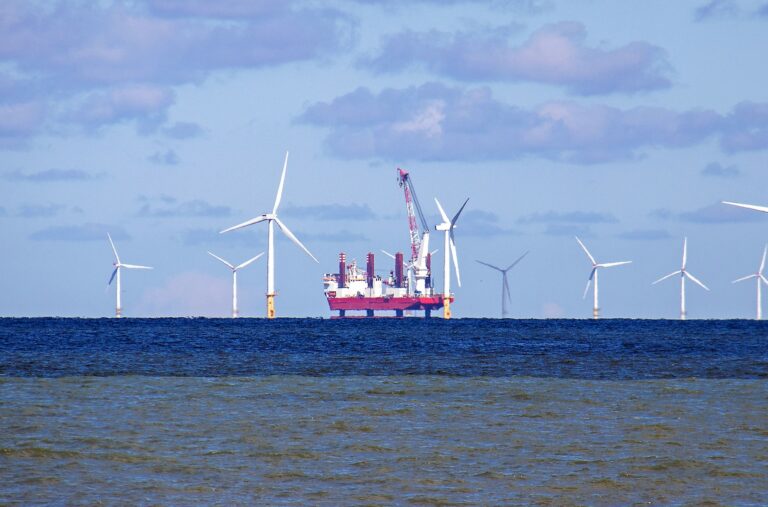 Seascape with a wind farm and gas platform in the Irish Se North Wales