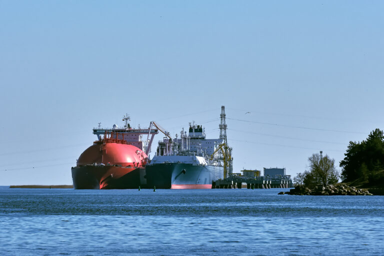 LNG tanker and carrier as floating LNG storageand import terminal in port. Alternative gas supply, commercial freight, energy crisis, diversification