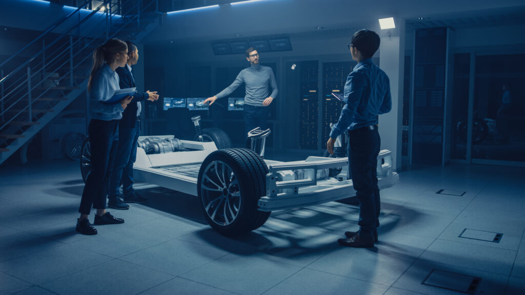 Automobile Engineers Working on Electric Car Platform Chassis, U