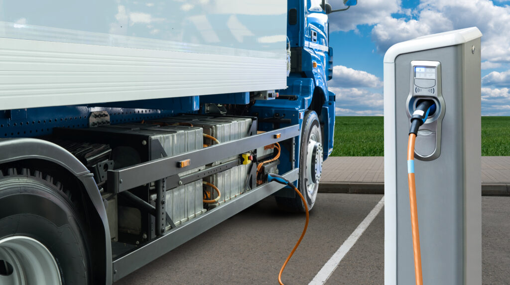 Electric truck with charging station