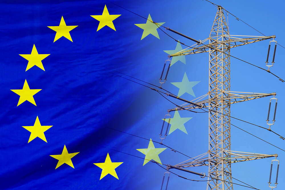 EU flag on electric pole background. Increasing energy consumption, energy crisis in European Union. Price energy are getting more expensive