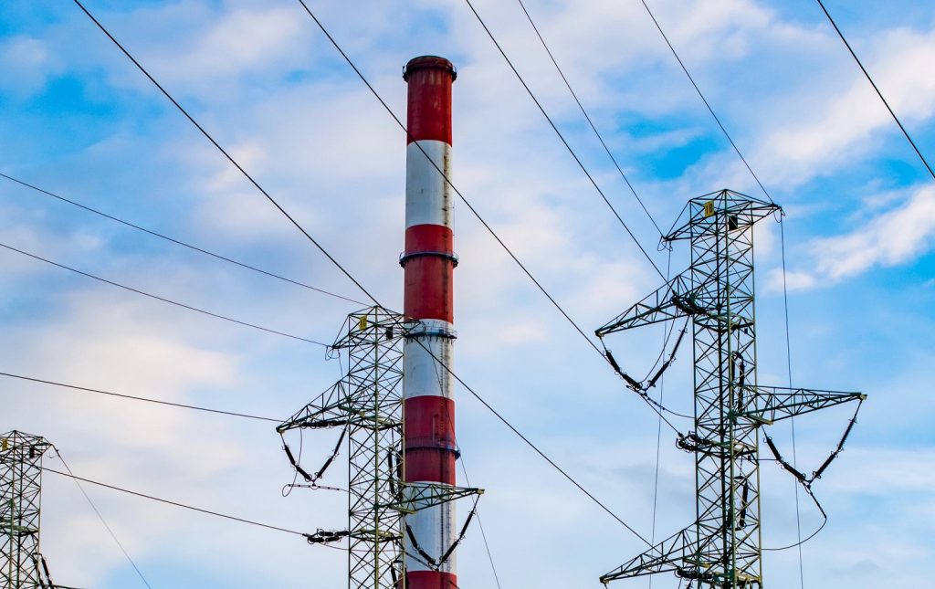 Coal-fired power plant with chimneys
